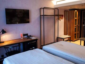 Фото номера Двухместный номер с 2 отдельными кроватями Отель Original Sokos Hotel Vaakuna Kouvola г. Коувола 9