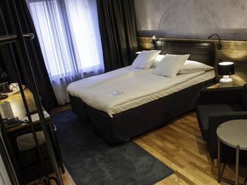 Фото номера Четырехместный номер Отель Original Sokos Hotel Vaakuna Kouvola г. Коувола 4