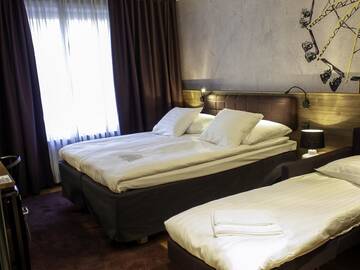 Фото номера Четырехместный номер Отель Original Sokos Hotel Vaakuna Kouvola г. Коувола 5